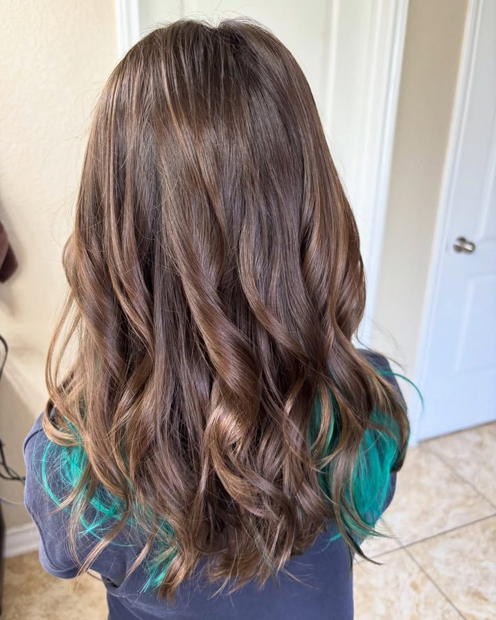 Brunette curls with a teal peekaboo underneath